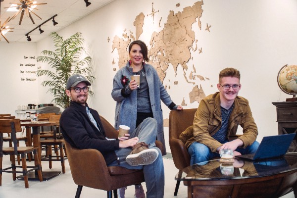 Guests and baristas inside the cafe